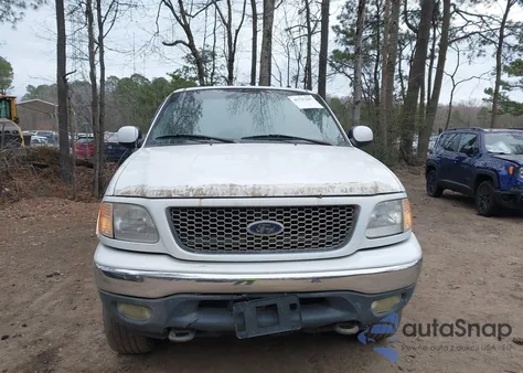 2000 Ford F-150 z USA, uszkodzony, nr VIN 1FTRX18L3YNA61333